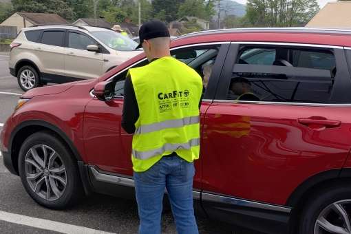 Carfit Event Photo Car Fit Technician at work